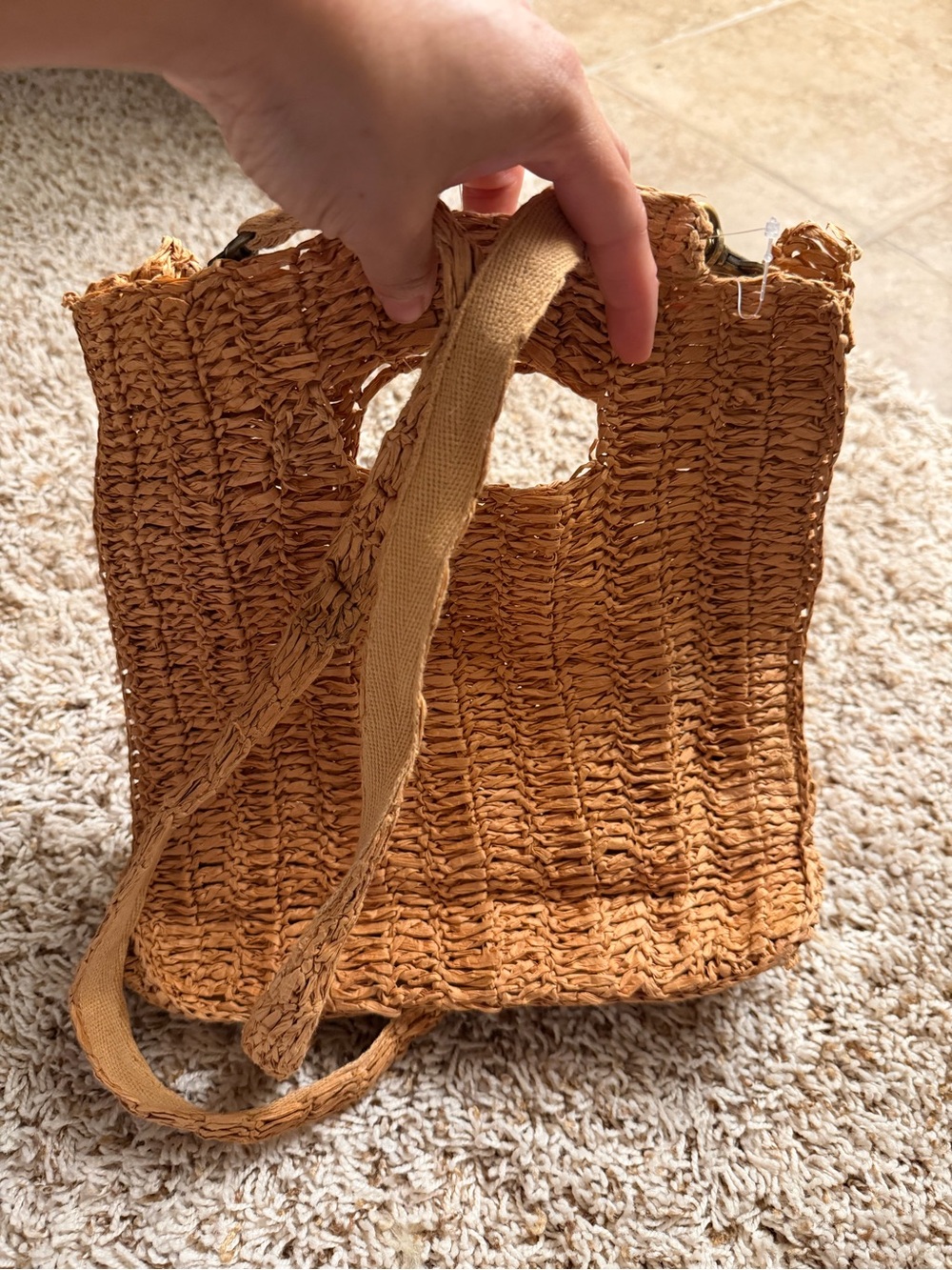New raffia or woven straw crossbody bag is a bohemian and beachy accessory s